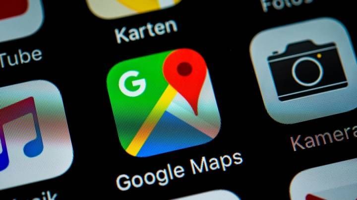 Close-up of a smartphone screen showing the Google Maps app icon surrounded by other app icons.