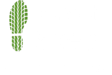 Green leaf-patterned exclamation mark on a white background