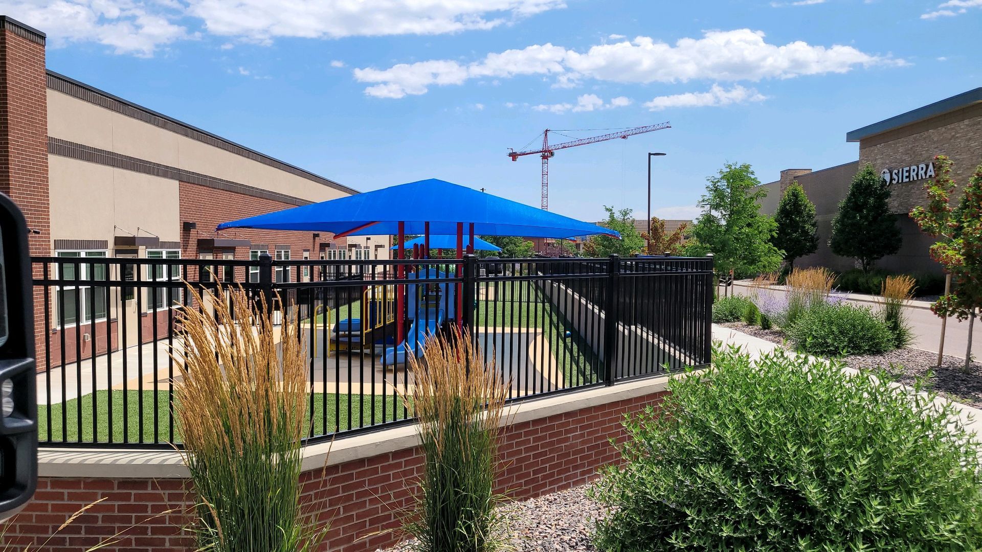 commercial building in Boulder  with an ornamental fence.