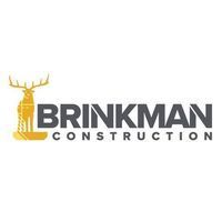 A logo for brinkman construction with a deer on it.