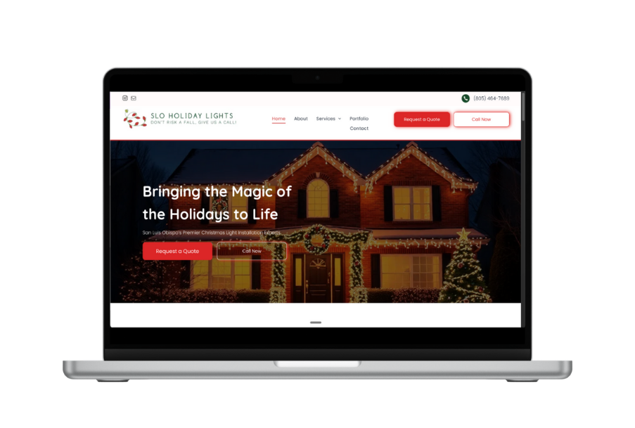 Laptop displaying a website: A decorated house at night with holiday lights; headline reads 