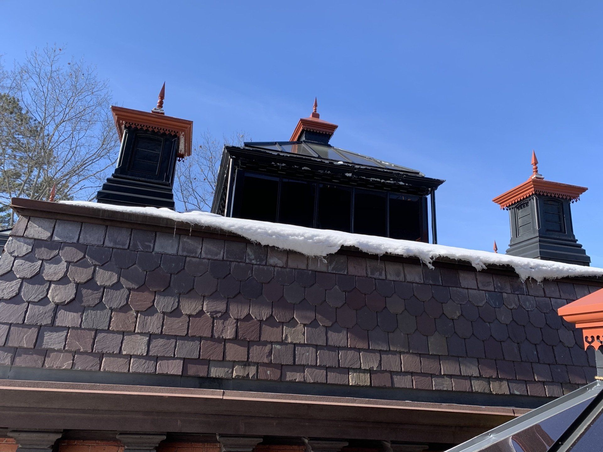 Slate Shingle roof installed by Vermont Roofing Contractors at Rodd Roofing in Winter