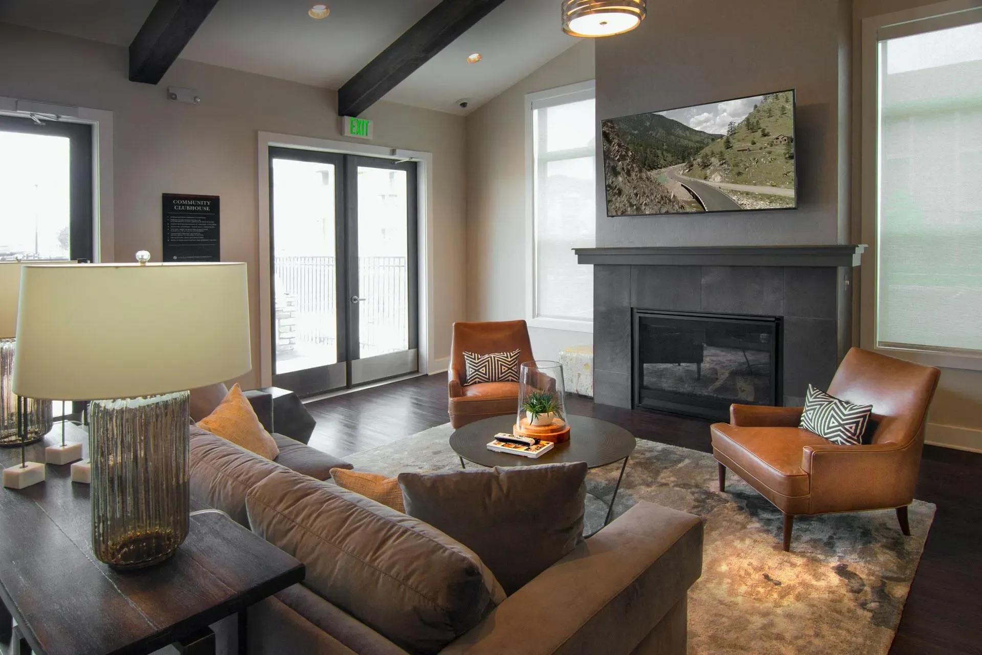 Lobby with fireplace and seating area.