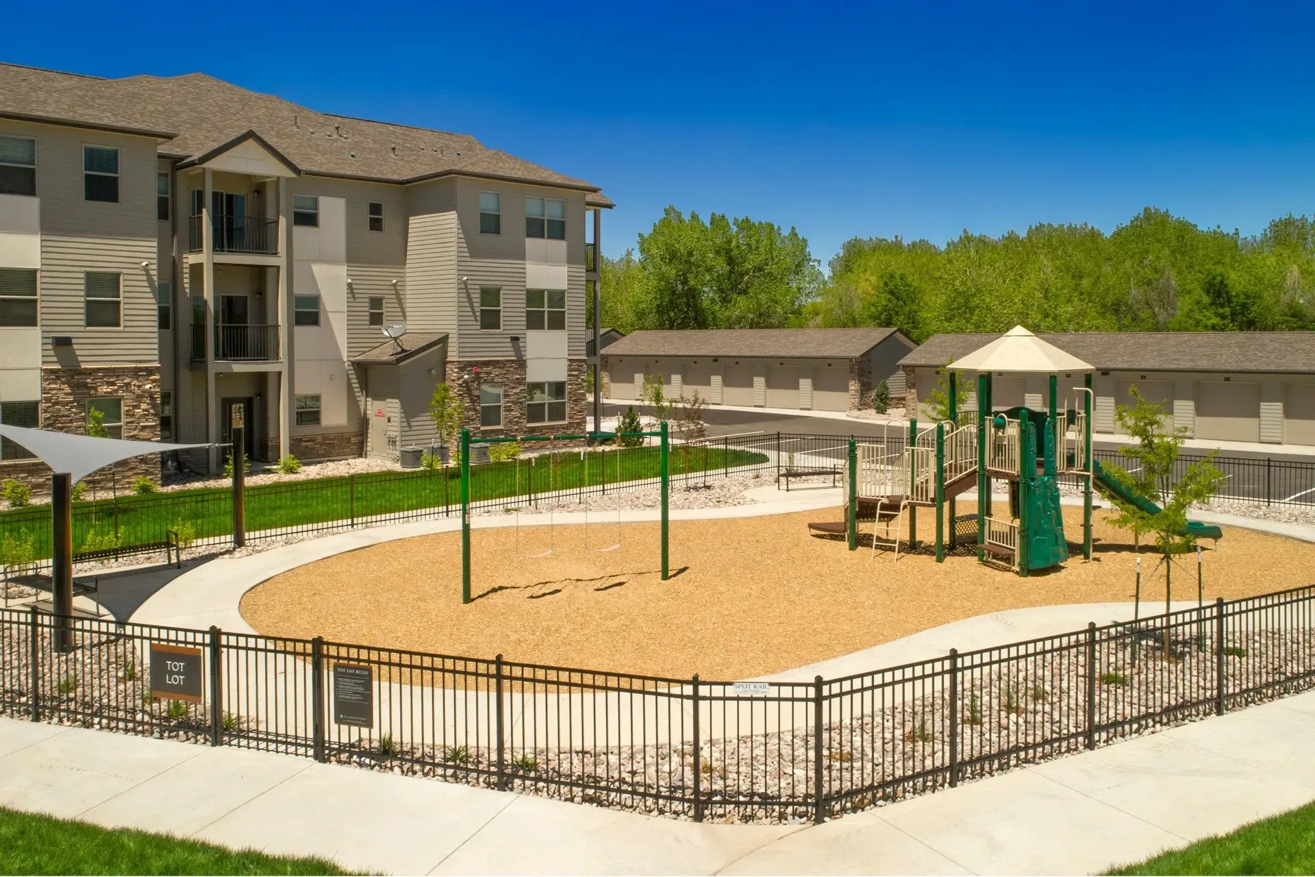 Playground and swingset area within apartment complex