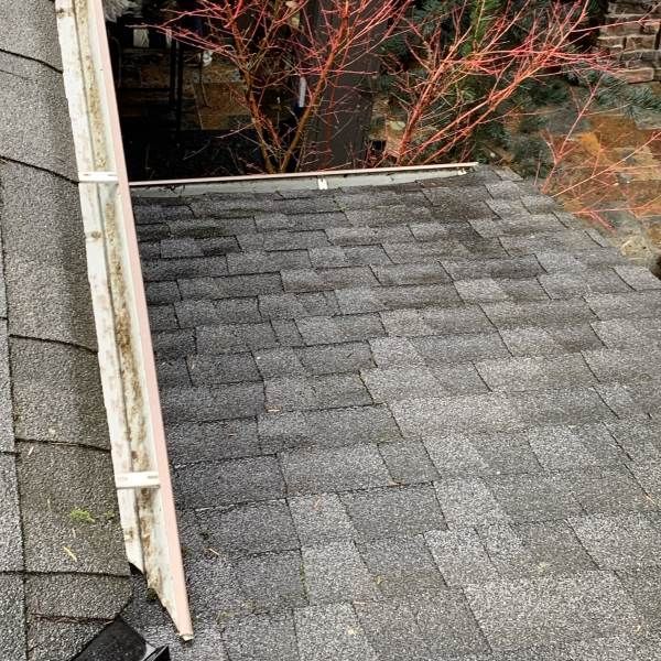 Power washing a house