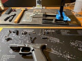 Left hand shooter holding a gun and shooting on the shooting range