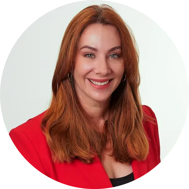 A woman in a red jacket is smiling in a circle
