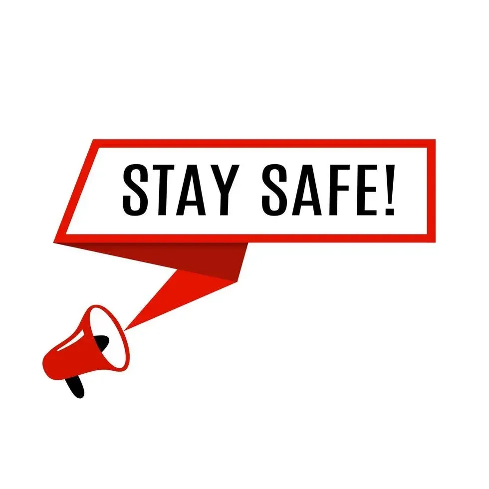A red megaphone with a speech bubble that says `` stay safe ''.