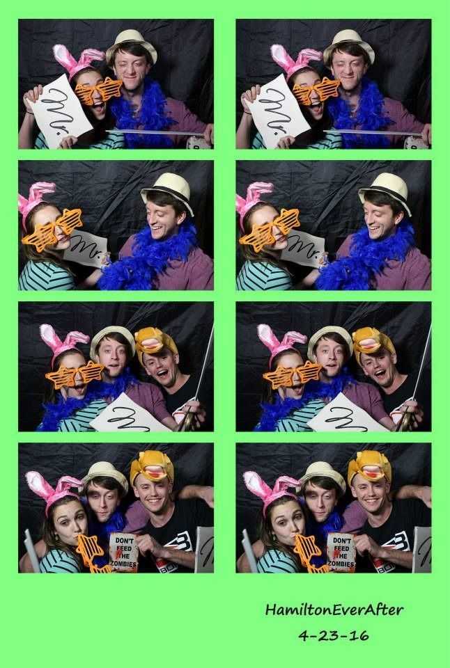 Photo booth strip of four friends in costume on a black background with neon green border, smiling and posing.