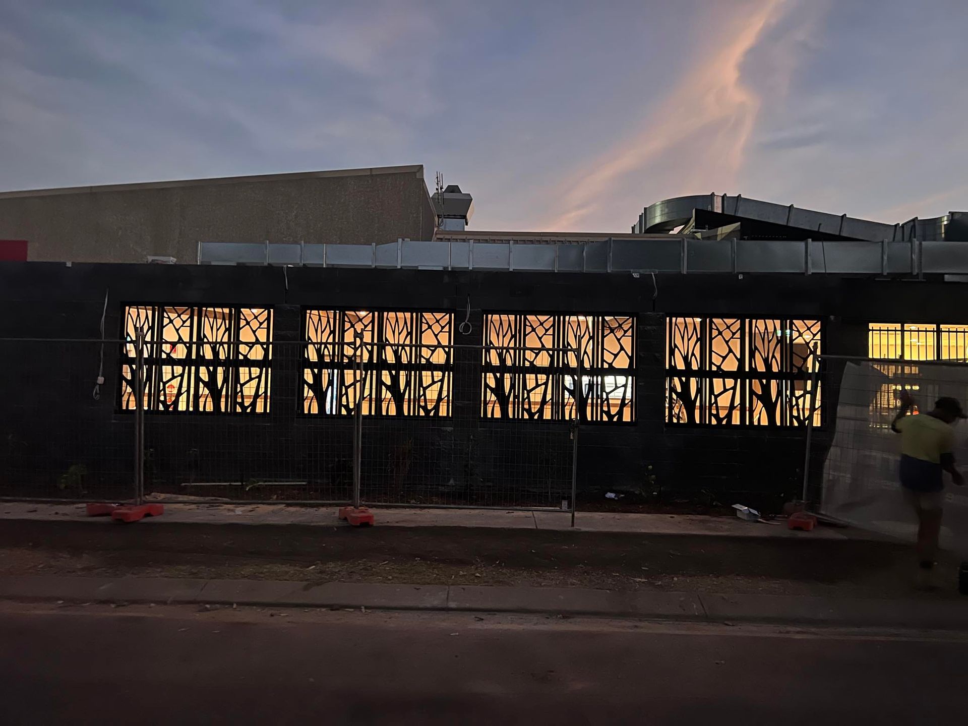 A Large Metal Structure is Being Built on Top of a Building — AKS Welding & Fabrication in Winnellie, NT