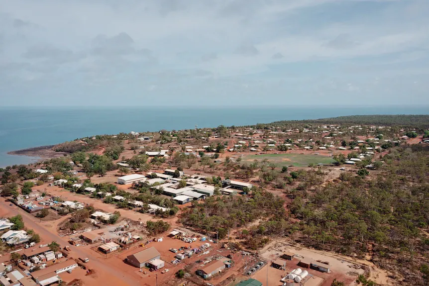 A Blue House is Sitting on Top of a Dirt Field — AKS Welding & Fabrication in Winnellie, NT