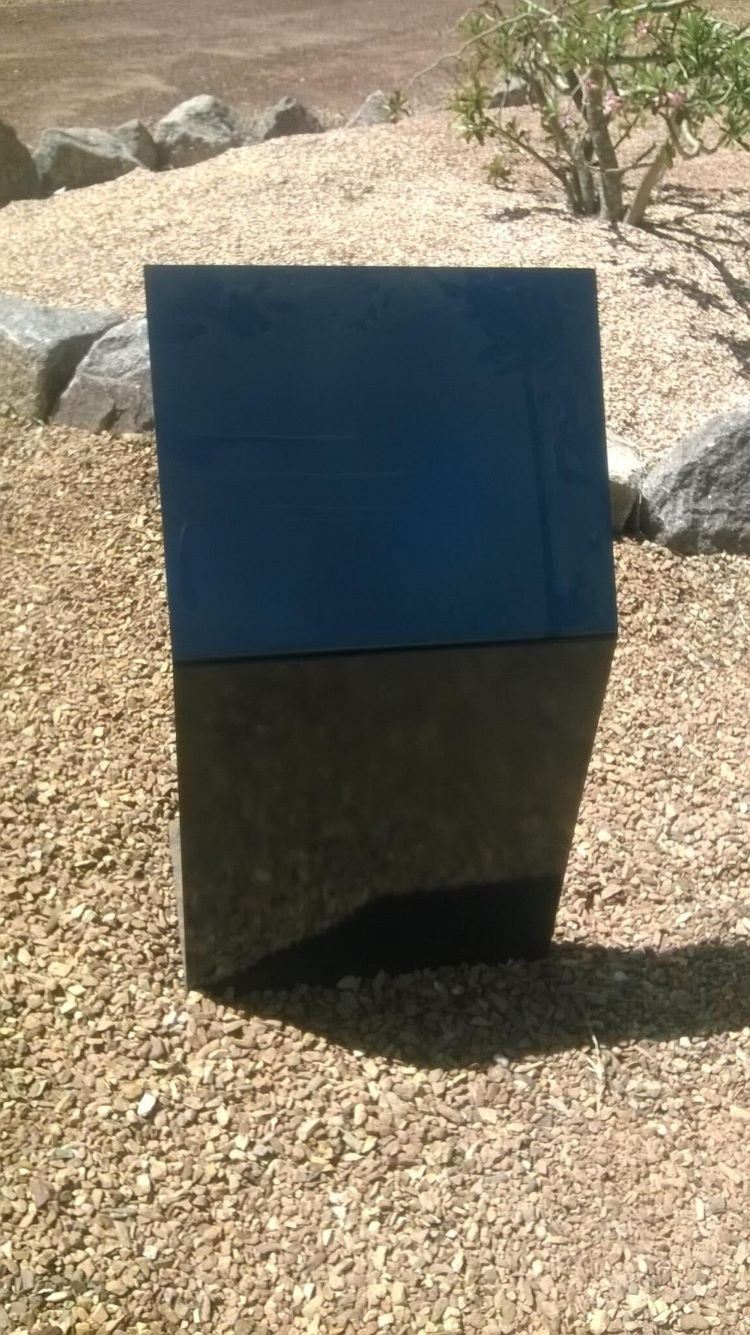 A Black Cube is Sitting on Top of a Pile of Gravel — AKS Welding & Fabrication in Winnellie, NT