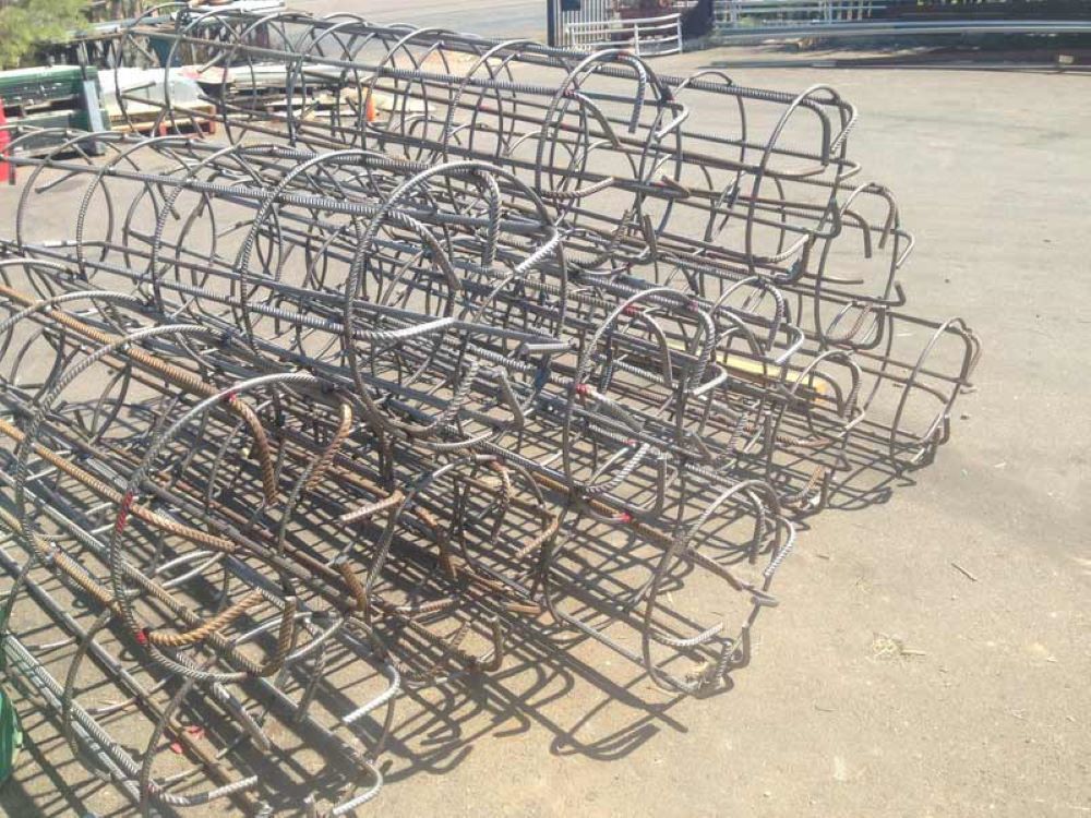 A Bunch of Metal Frames Are Stacked on Top of Each Other — AKS Welding & Fabrication in Winnellie, NT