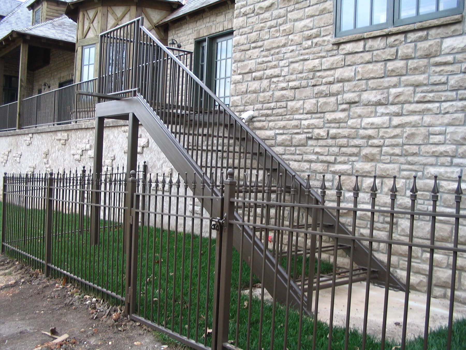 A set of stairs leading up to a brick building