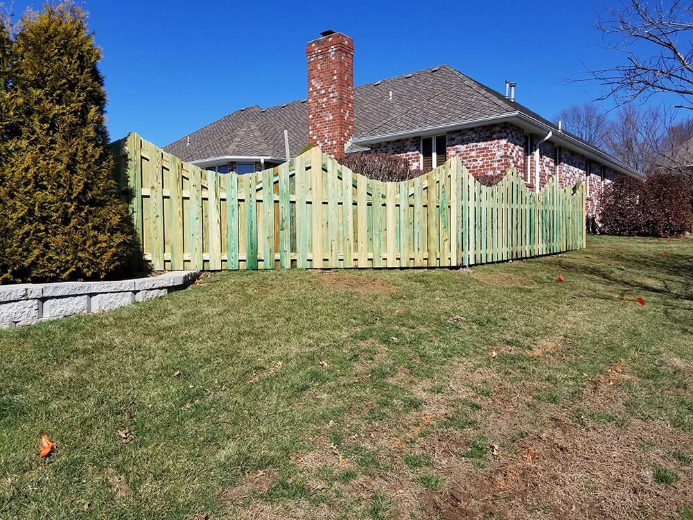 home with wood fence around it springfield mo