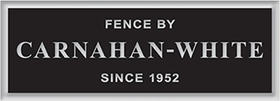 A black sign that says fence by carnahan-white since 1952 | Best fencing company in Springfield MO