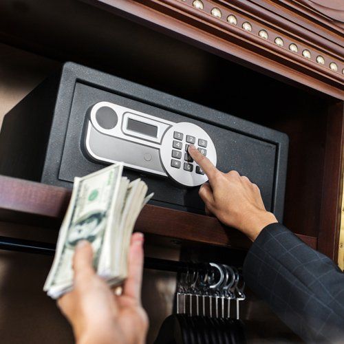 Putting Money On Safe — Saint Paul, MN — Kat – Key’s Lock & Safe Putting Money On Safe — Saint Paul, MN — Kat – Key’s Lock & Safe