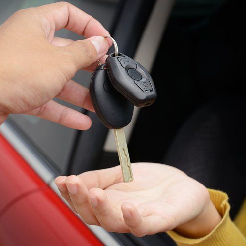 Handing Over Car Keys — Saint Paul, MN — Kat – Key’s Lock & Safe Handing Over Car Keys — Saint Paul, MN — Kat – Key’s Lock & Safe