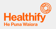 Healthify logo in orange and white. Features stylized spiral and Maori text.