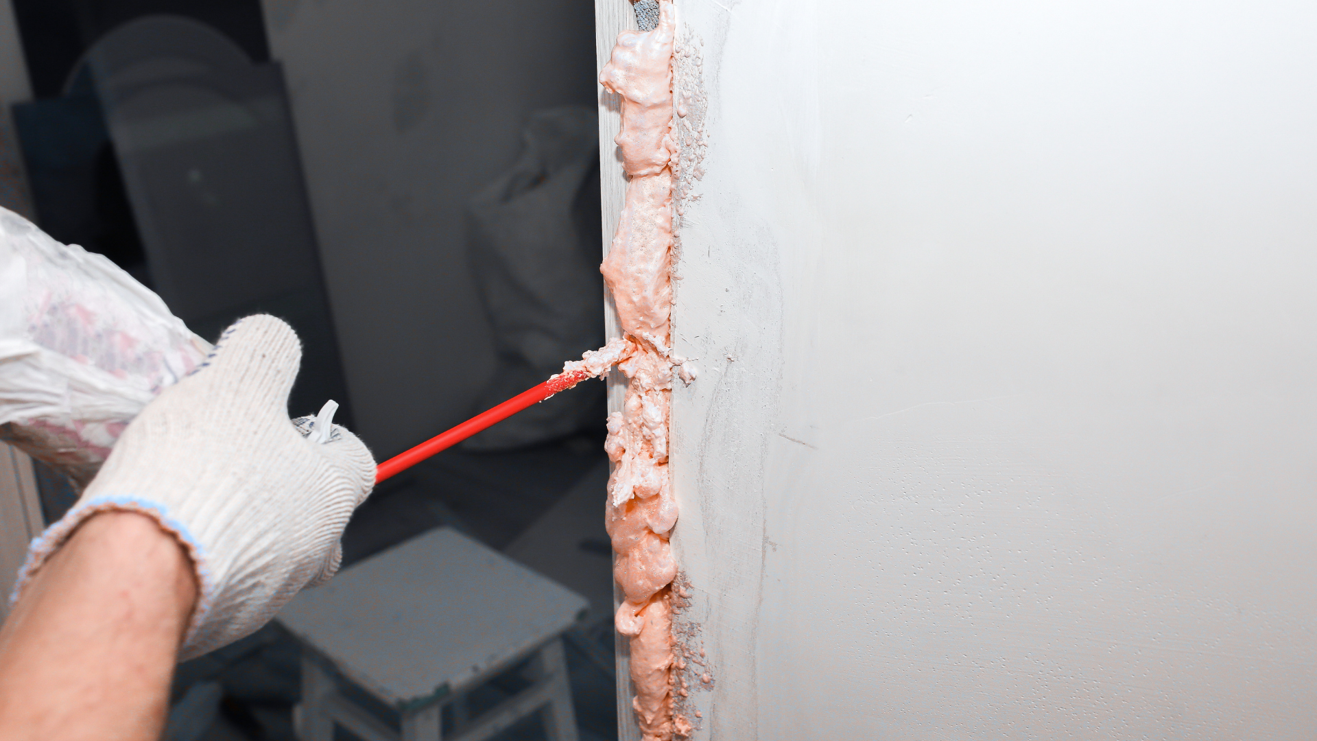 Sound dampening spray foam applied in interior office walls