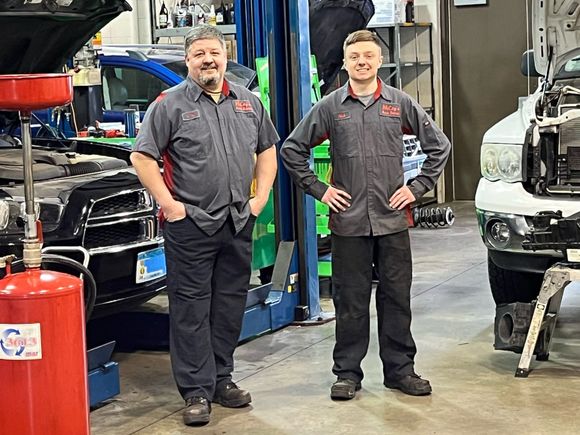 Car Repair Man Smiling - Coon Rapids, MN - McCoys Auto Repair Service