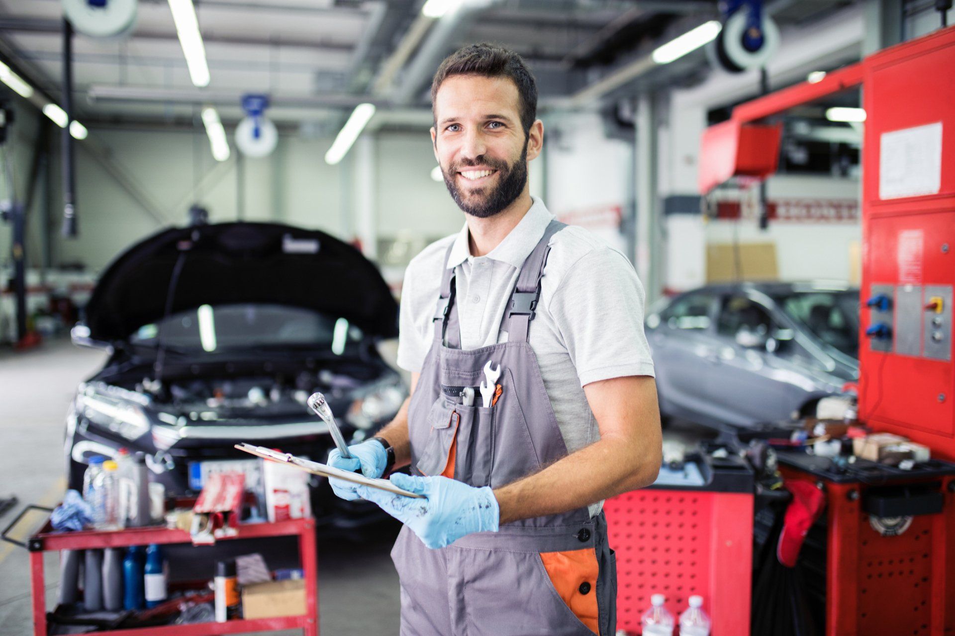 Car Repair Man Smiling - Coon Rapids, MN - McCoys Auto Repair Service
