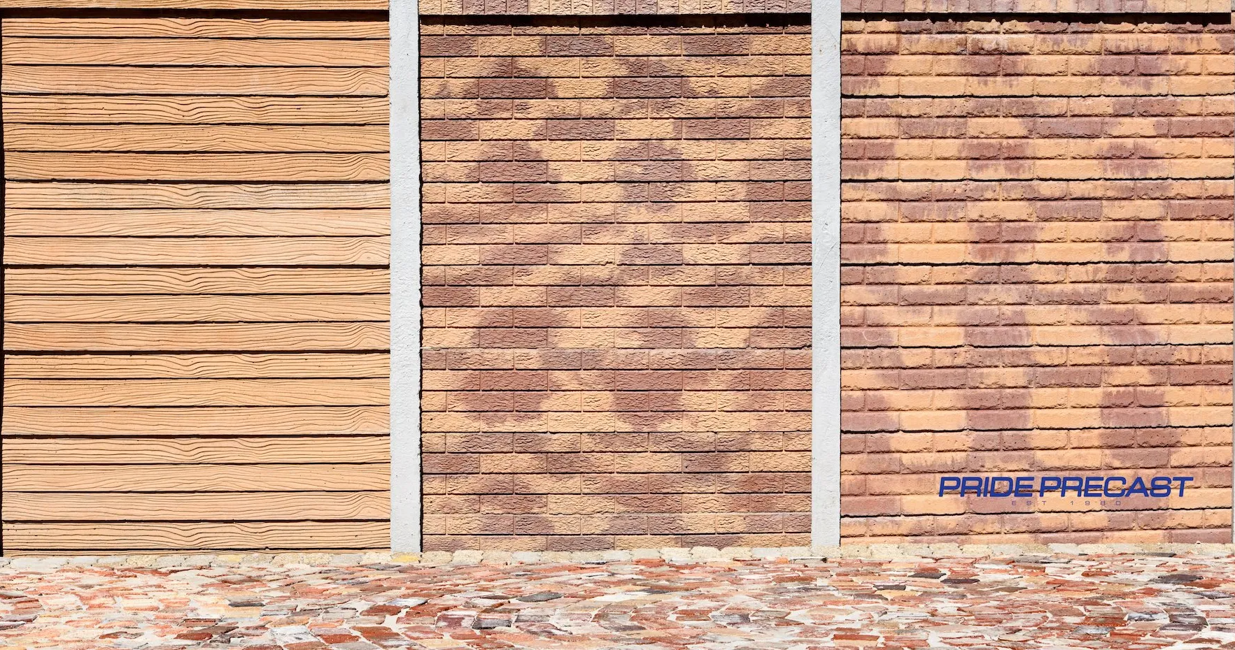 A brick wall with three different types of wood slats on it.
