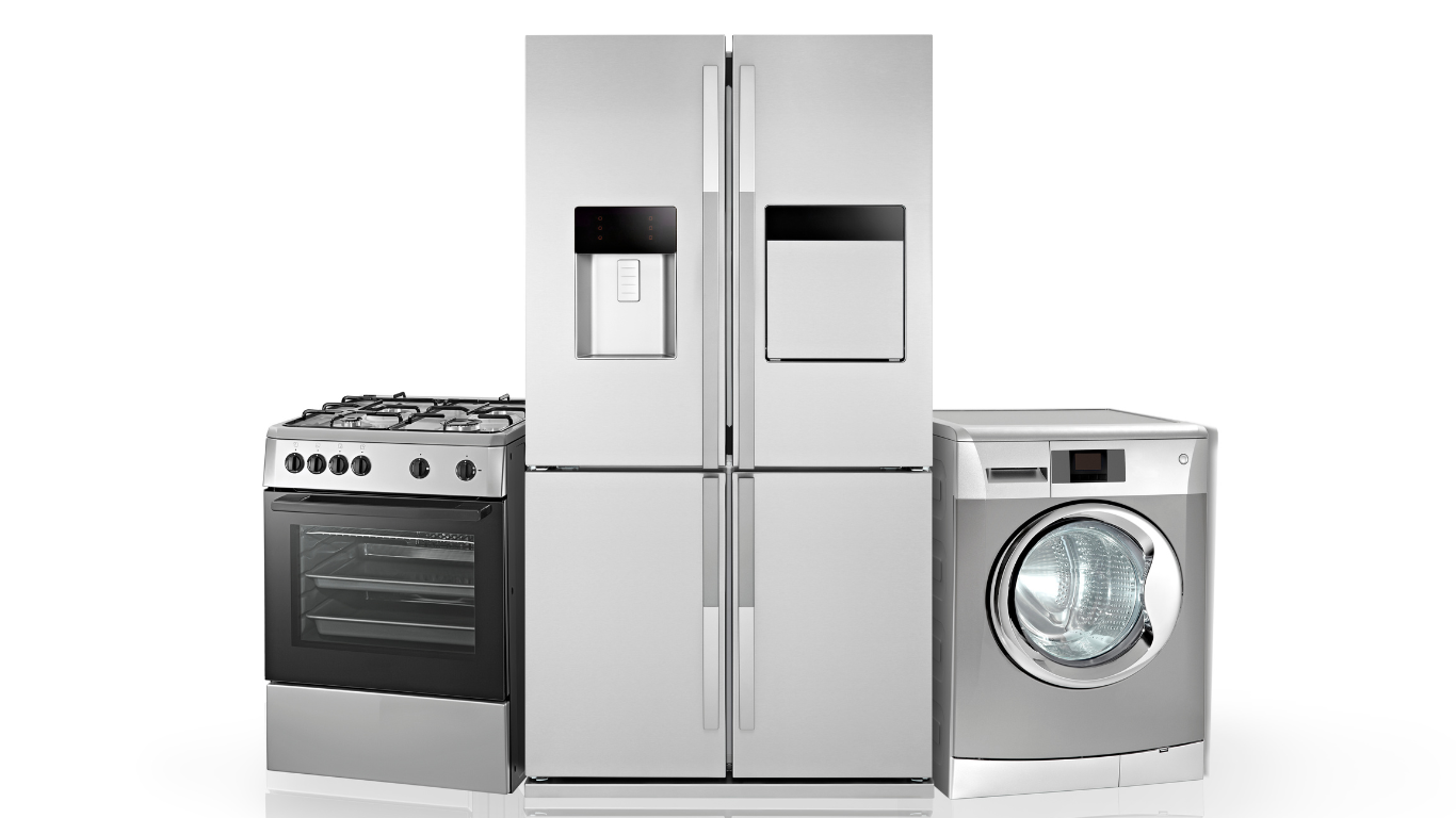 A refrigerator , stove , washer and dryer are sitting next to each other on a white background.