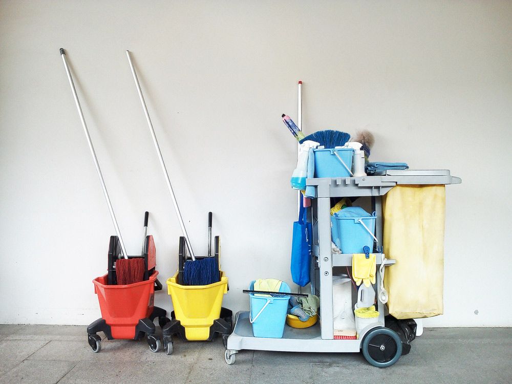 A Cleaning Cart with Buckets and Mops on It — North Coast Commercial Cleaners In Caloundra, QLD