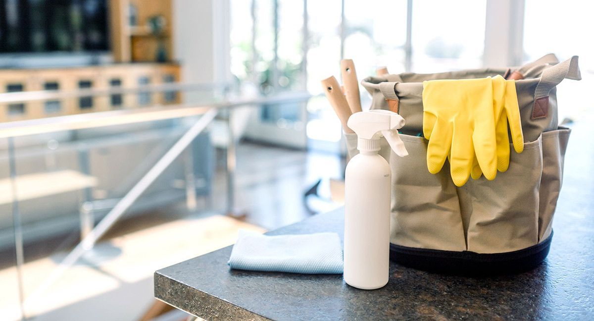 A Kitchen Counter with A Spray Bottle  — North Coast Commercial Cleaners In Bli Bli, QLD