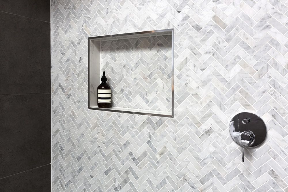 A Shower With A Soap Dispenser In A Niche On The Wall — Corrimal Ceramic Tiles Pty Ltd in Albion Park, NSW