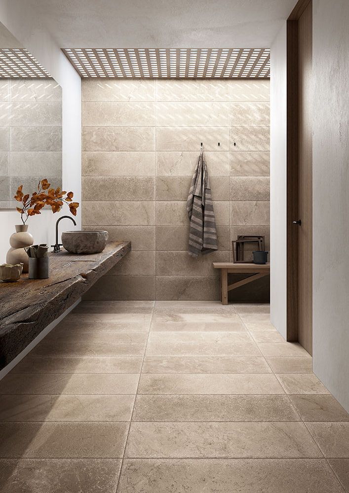 A Bathroom With A Sink And A Towel Hanging On The Wall — Corrimal Ceramic Tiles Pty Ltd in Corrimal, NSW