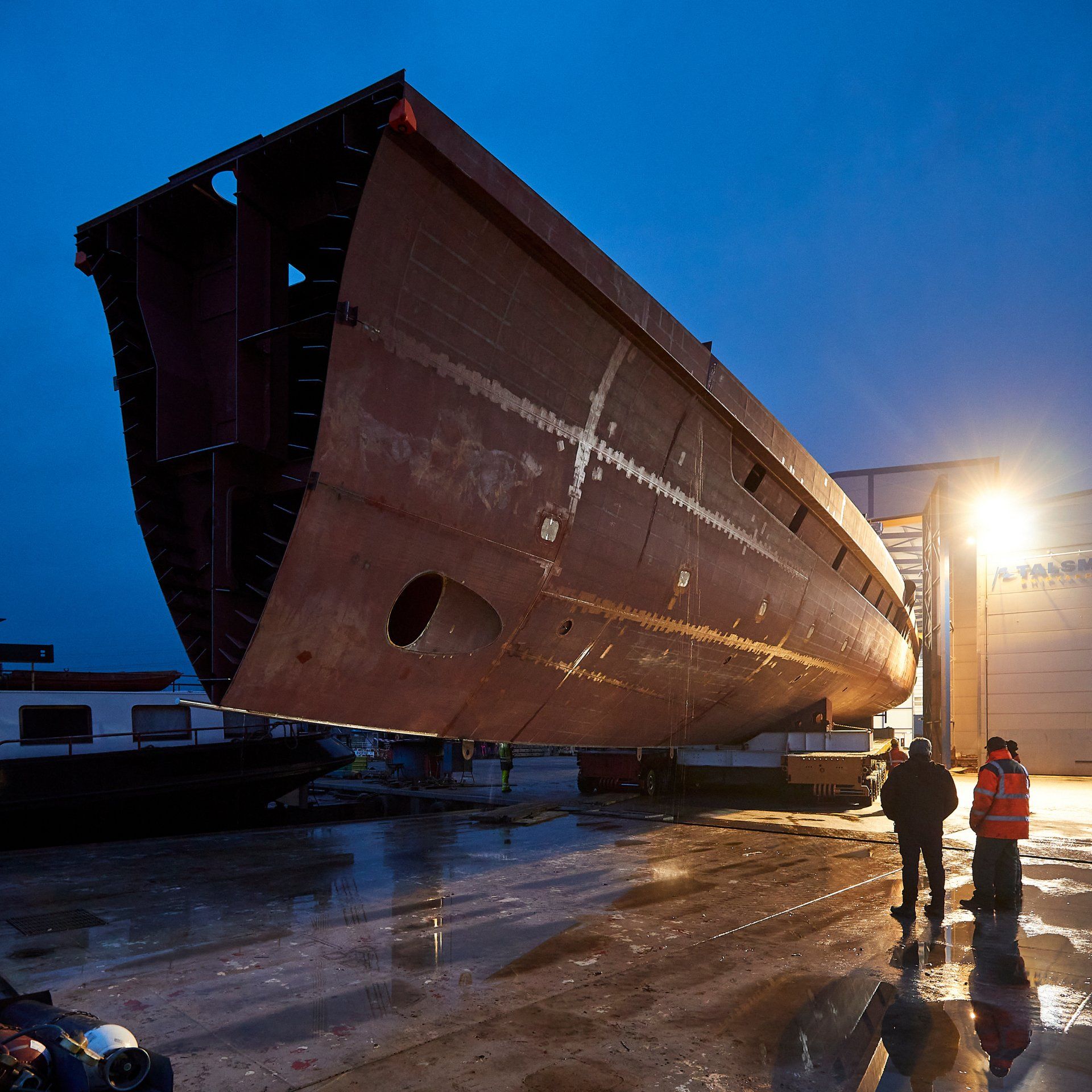 Heesen Yacht 20067 steel hull leaving the shed in Friesland. ©Dick Holthuis International Yacht Photographer