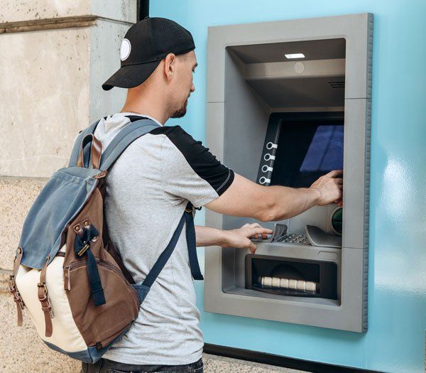 Man Withdrawing His Money Man Withdrawing His Money