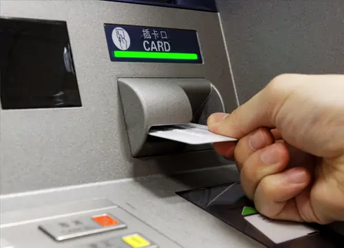 Inserting card into ATM machine