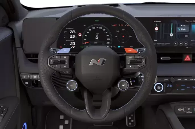 The steering wheel of a car with the letter n on it Ioniq 5 N