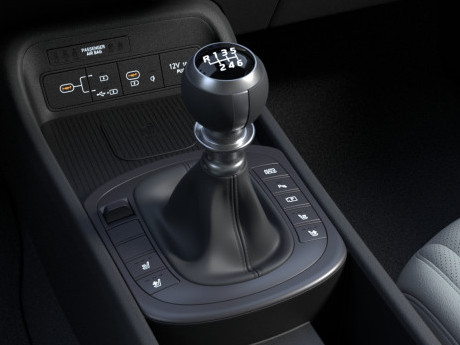 A close up of a shifter in a car Kona