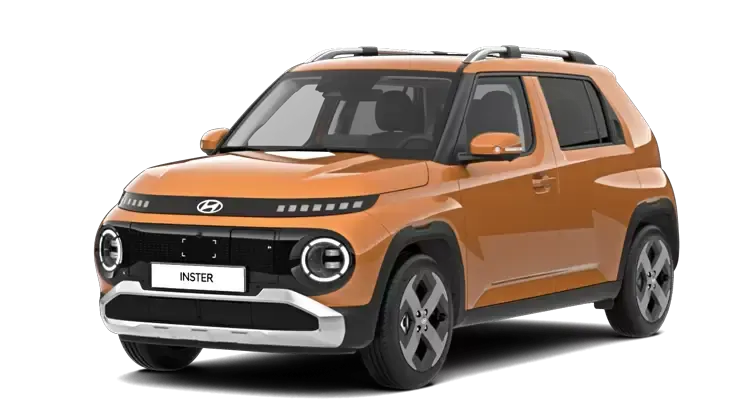 A small orange car is sitting on a white surface. Inster