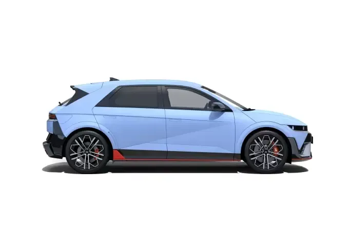 A blue car is sitting on a white surface. Ioniq 5 N