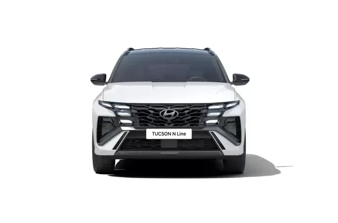 The front of a white hyundai tucson is shown on a white background.