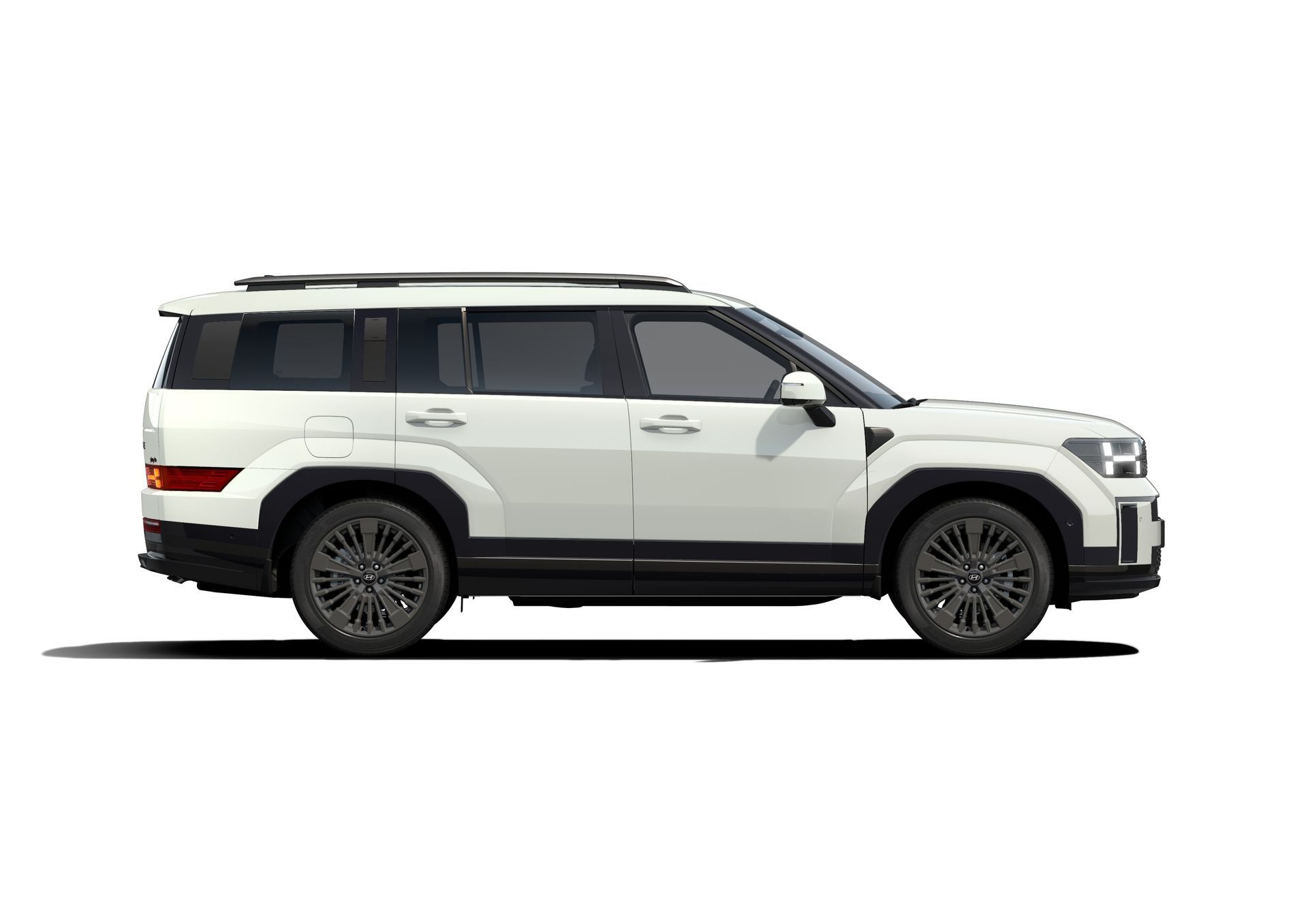 A white suv is shown from the side on a white background. Santa Fe