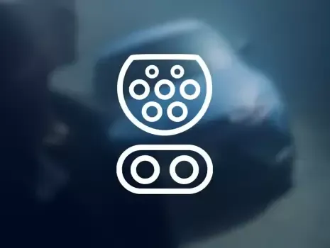 An icon of a charging port on a car.