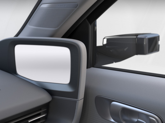 A close up of a car side view mirror Ioniq 6