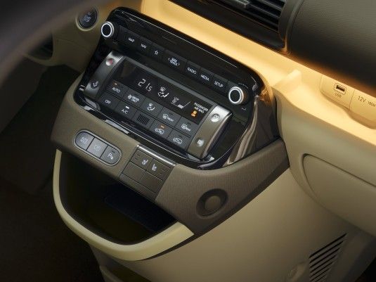 A close up of a car dashboard with a display that says 24 Inster