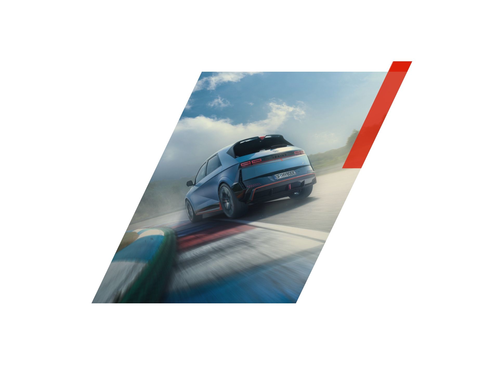 A blue car is driving down a race track. Ioniq 5 N