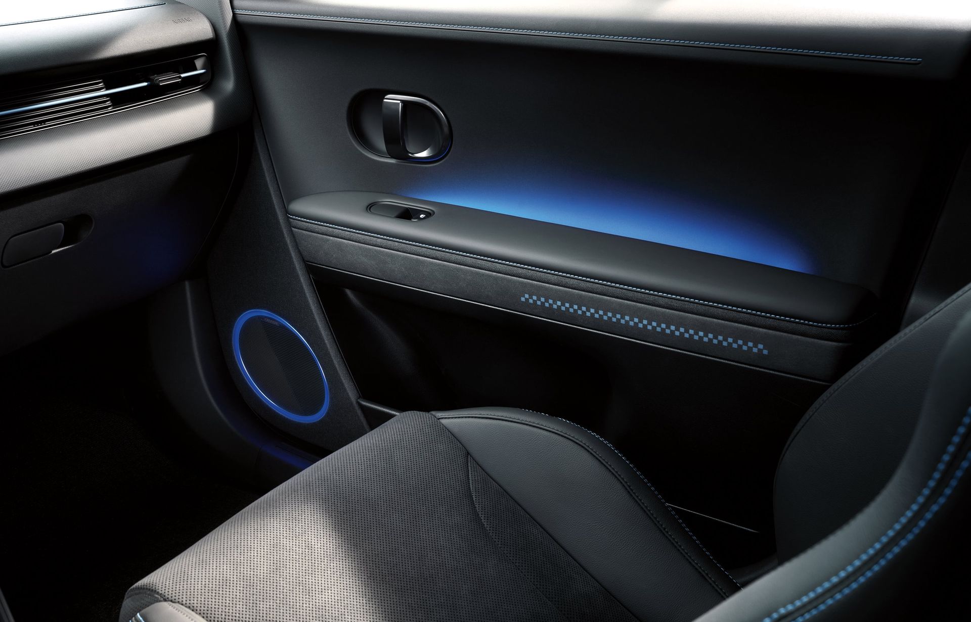 A close up of a car door with a blue light on it. Ioniq 5 N
