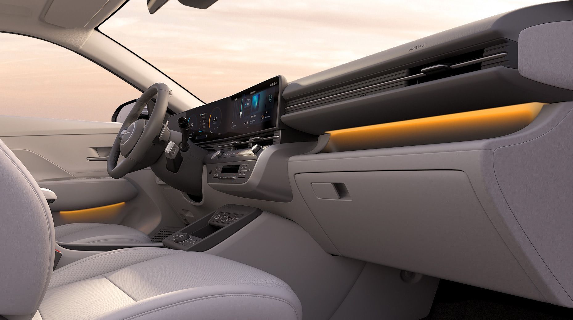 The interior of a car with a steering wheel and dashboard. Kona Electric