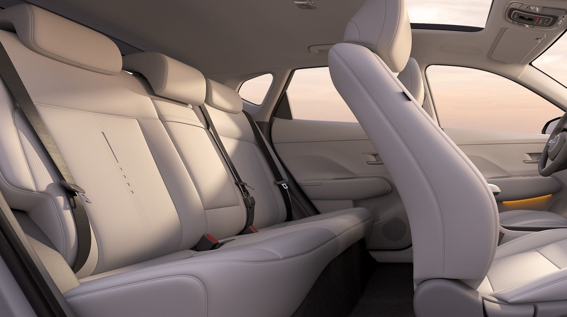 The back seat of a car with seat belts on it Kona Electric