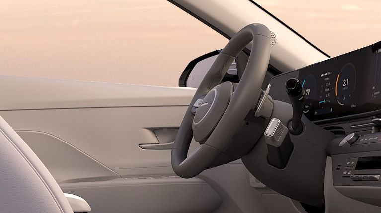 A close up of the steering wheel of a car Kona Electric