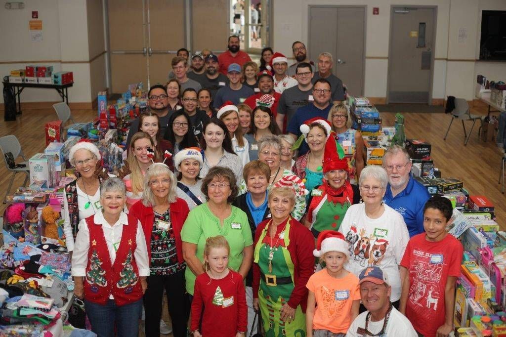 How can companies get involved with Christmas volunteering?